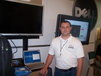 Urias at the Dell booth at OpenSource World.